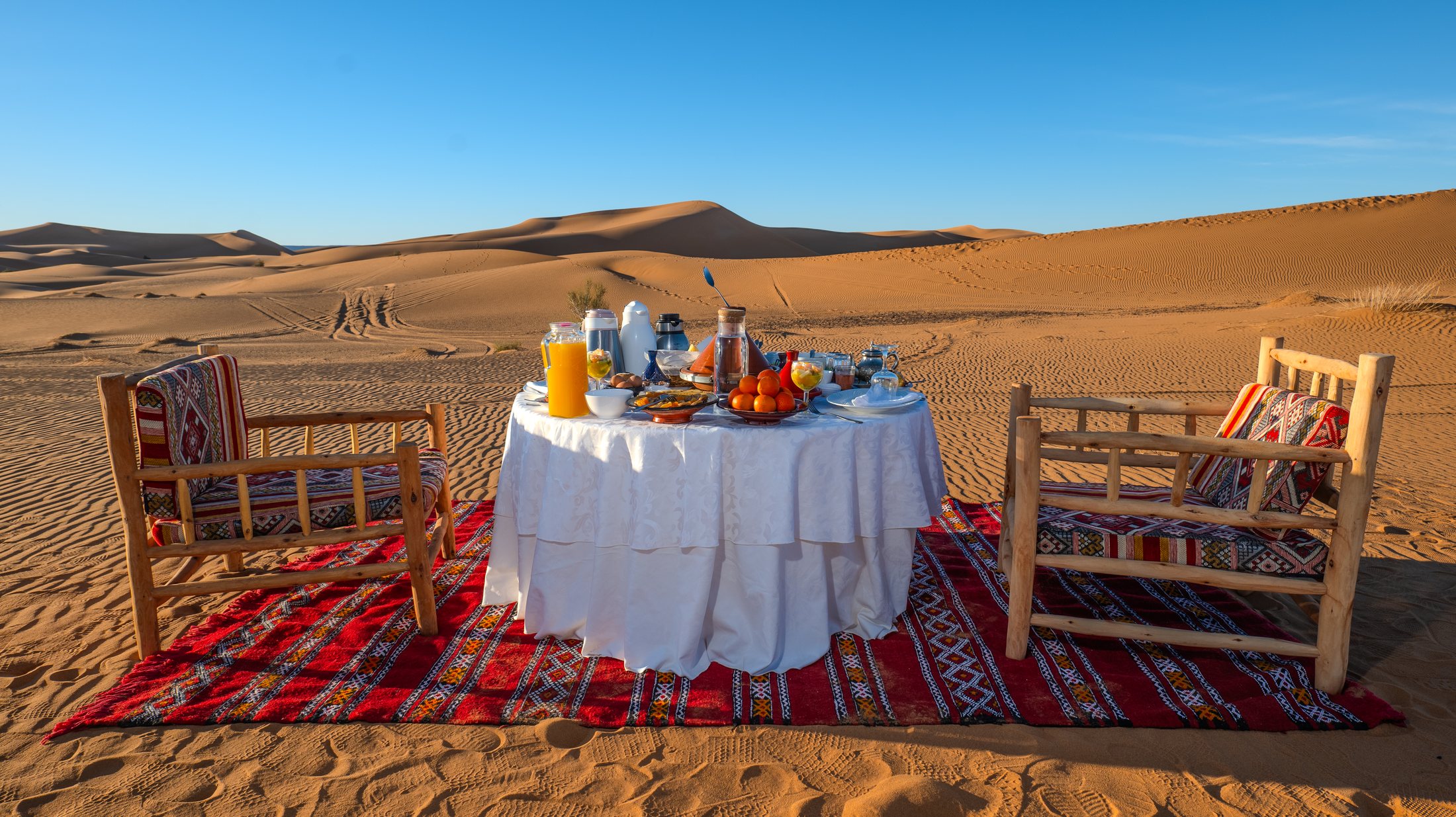 Breakfast arranged outdoors in the Sahara desert